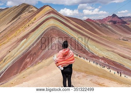 Woman Enjoying The Magnificient View Of Rainbow Mountain Peru South America