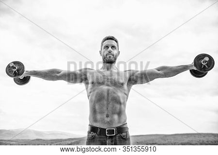 Hustle To Gain More Muscle. Healthy Mind In Healthy Body. Muscular Man Exercising With Dumbbell. Dum