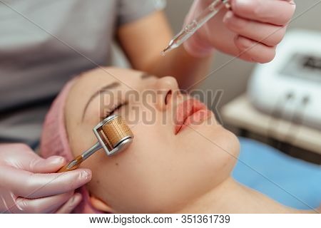 Beautiful Girl Woman In Spa Salon, Facial Rejuvenation Procedure.visit A Beautician.hyaluronic Acid 