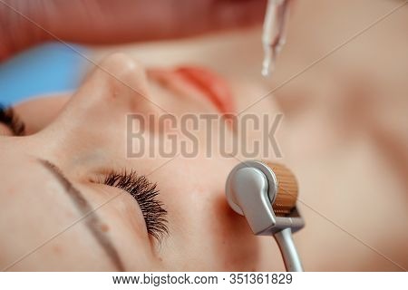 Beautiful Girl Woman In Spa Salon, Facial Rejuvenation Procedure.visit A Beautician.hyaluronic Acid 