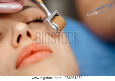 Beautiful Girl Woman In Spa Salon, Facial Rejuvenation Procedure.visit A Beautician.hyaluronic Acid 