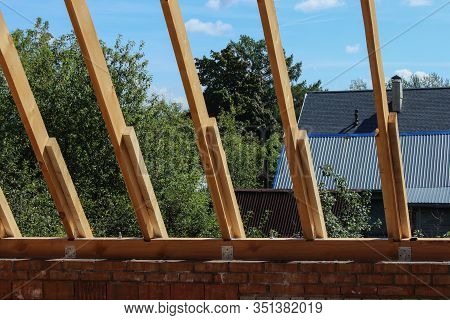 Roof Trusses Not Covered With Ceramic Tile On A Detached House Construction, Visible Roof Elements,