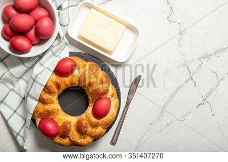 Tasty Easter Bread. Easter Bread And Red Eggs. Italian Easter Bread.place For Text