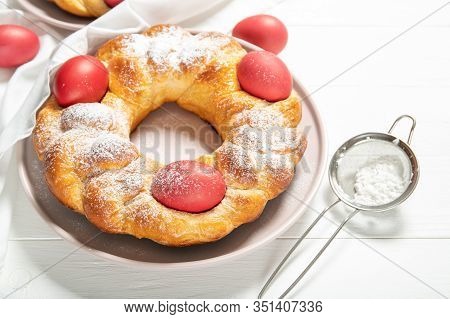 Tasty And Beautiful Italian Easter Bread. Italian Easter Bread In The Hands Of A Guy