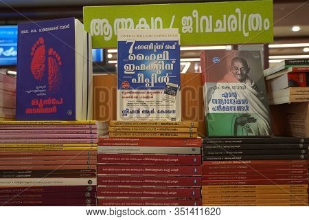 A Set Of Malayalam Novels Displayed In A Book Store. A Shelf Full Of Old And New Malayalam Books - K
