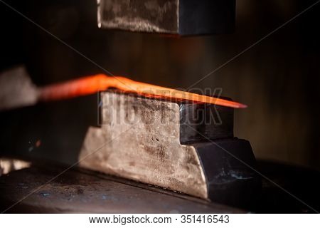 Blacksmith Machine For Forging A Deta Il Out Of The Hot Metal