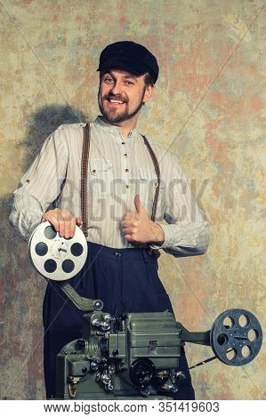 Young Beard Projectionist Man Going Thumb Up