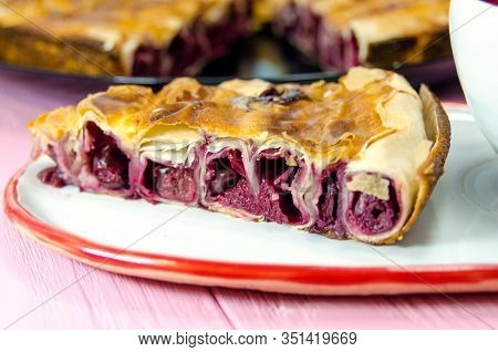 Fresh Slice Of Cherry Pie With Heart Shaped Cup.traditional Bulgarian Pie Banitsa Made From Filo Pas