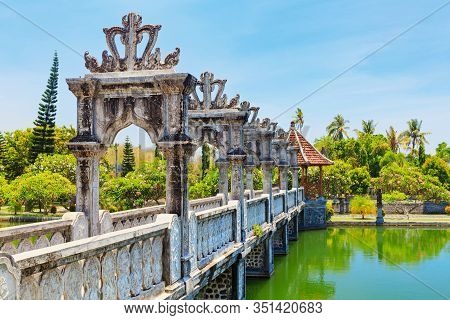 View Of Ancient Bridge In Taman Ujung Near Alampura In Karangasem On Bali Island. Water Palace Of Ba