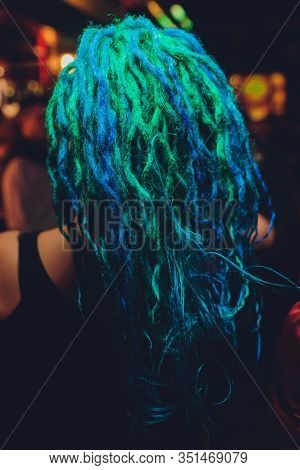 Young Woman With Blue Hair Close-up Back.