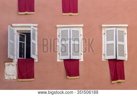 The Red Flags On Houses In Easter (island Corfu, Greece)
