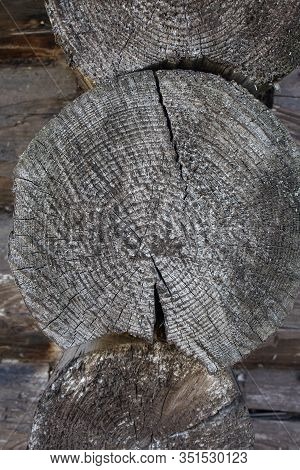 Log Masonry. Corner Of The Log Cabin Made Of Logs.