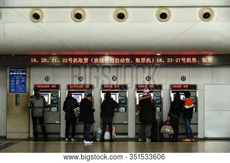 Yiwu, China - December 29, 2017: At Train Station The Passenger Is Buy Tickets From Automatic Train 
