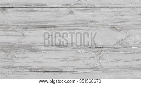 Top View Of A Table From Old Wooden Boards With Peeling Burnt Out White Paint With Scratches. Light 
