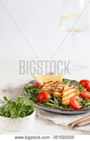 Fresh Salad With Grilled Halumi Cheese, Cherry Tomatoes And Arugula. Copy Space.