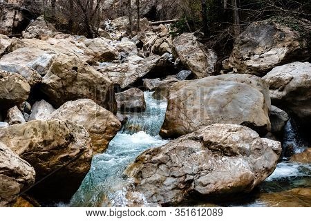 The Mountain River Roudoule In The Low French Alps: The Turquoise Stream Running Through The Rocks
