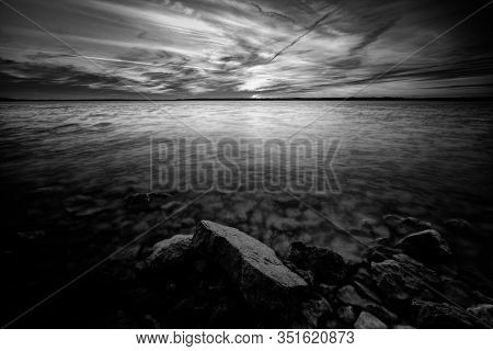 Moody Sunset Over Benbrook Lake In North Texas