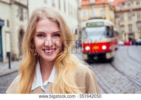 Blonde Woman Stand In Bus Stop And Waiting Trolley In Prague Sity Chezh