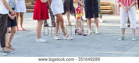 Social Dance And Flashmob Concept - Fun And Dance With In The Summer On A City Street. Close-up Of D