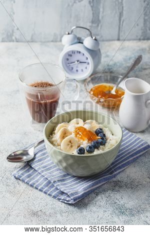 Breakfast With Milk Rice Porridge With Banans And Blueberry, Creamy Rice Pudding Or French Riz Au La