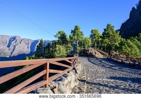 Scenic View On Caldera De Taburiente With Green Pine Forest, Ravines And Rocky Mountains Near Viewpo