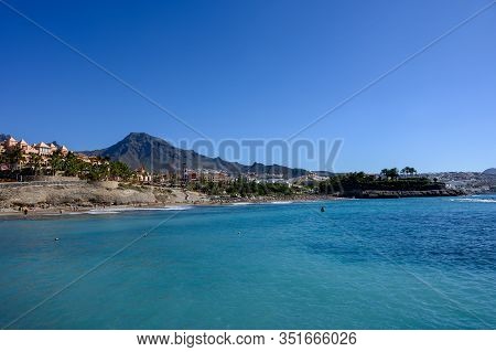All Year Sun Vacation Destination, Blue Ocean Water On  Beach Playa Del Duque In Costa Adeje, Teneri