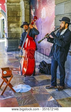 Puebla, Mexico - January 5, 2019 Orthodox Jewish Street Performers Zocalo Puebla Mexico. Jewish Musi