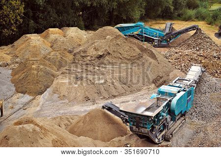 Stone Crusher In A Quarry, Mining Industry. Old Rock Crusher Machine In A Limestone Quarry