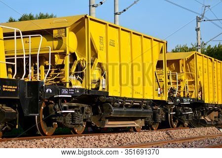 Cargo Train At The Station In City