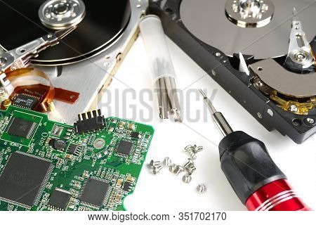Hdd - Hard Disk Drive. Hard Disk Repair Concept. The Hard Drive Is Designed To Store Data Of All Man