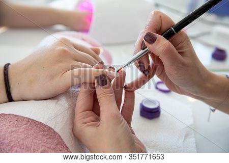 Manicure Process In Beauty Salon - Woman Hand Nails Care.