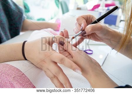 Manicure Process In Beauty Salon - Woman Hand Nails Care.