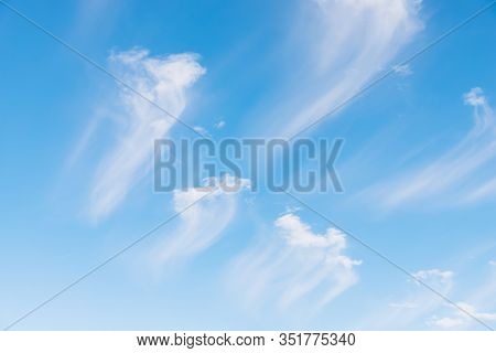 Beautiful White Clouds On A Blue Sky Background. Clouds Like A Brush Strokes