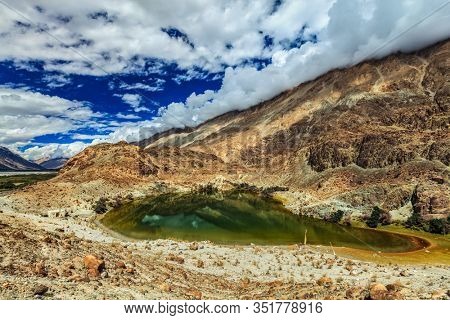 Lohan Tso mountain lake - sacred holy Tibetan buddhist buddhism piligrimage site. Nubra valley, Ladakh, India