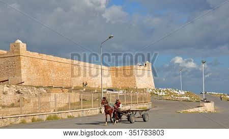 Mahdia, Tunisia - December 28, 2019: A Carriage Pulled By A Horse In Front Of The Ottoman Fortress B