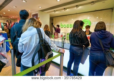 HONG KONG - JANUARY 22, 2019: people queue at Bossini shop in Hong Kong.