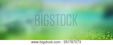 Luminous Abstract Nature Landscape. Blurry Nature View In Spring With Fflowers On A Meadow. Backgrou