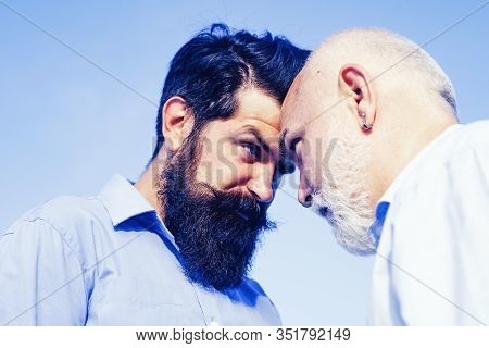 Men Generations: Grandfather And Father Together. Elderly Senior Man And Bearded Son - Two Generatio