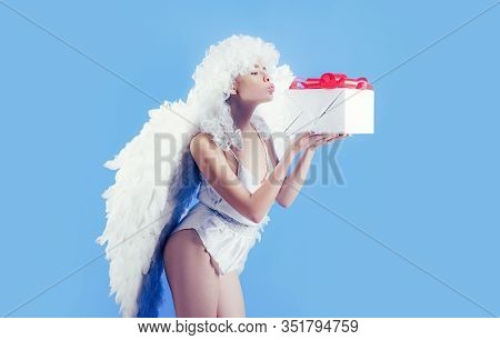 Angel With Gift. Valentines Day: Gift, Romantic And Date. Romantic Gifts And Valentines Gift Ideas