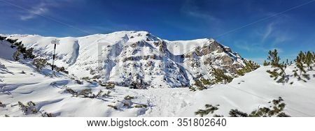 Panoramic View Of Mount Bucegi On Winter, Part Of Romanian Carpathian Range