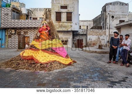Vrindavan, India - March 20, 2019: Effigy Of Goddess Holika On Woods Going To Burn On The Night Of H