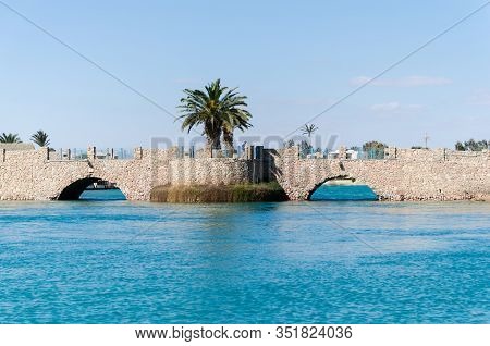 Bridge Over The Canal At El Gouna In Egypt. View From A Boat Sailing Along The Canals.