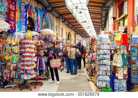 Larnaca, Cyprus - February 16, 2020: Tourist Souvenir Market In Pavilion, People Walking In Row Amon