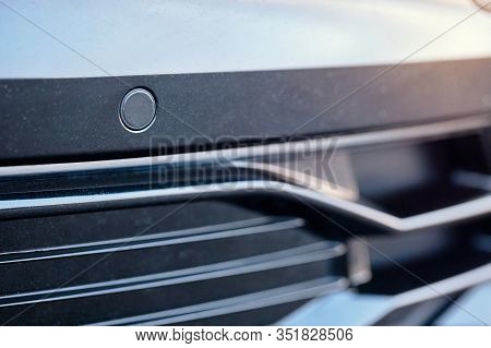 Selective Focus On Parking Sensor Of Parking Assistent System At Front Of Luxurious Car Bumper Close