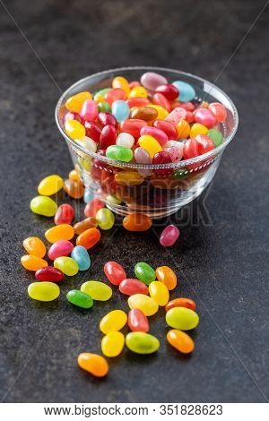 Fruity jellybeans. Tasty colorful jelly beans in glass bowl.