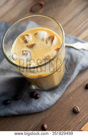 Iced Black Coffee With Milk And Ice Close-up