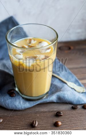 A Glass Of Refreshing Ice Coffee With Milk