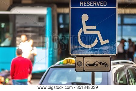 Bucharest, Romania - July 15, 2019: A Reserved Handicapped Parking Sign (reserved Disabled Parking S