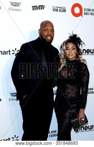 LOS ANGELES - FEB 9:  Terrell Suggs, Tasia Miller at the 28th Elton John Aids Foundation Viewing Party at the West Hollywood Park on February 9, 2020 in West Hollywood, CA