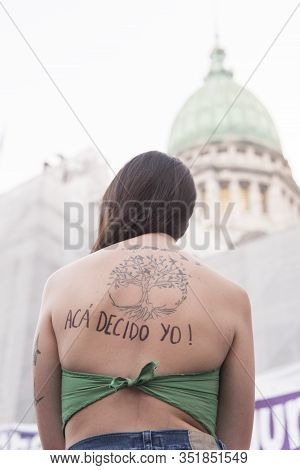 Caba, Buenos Aires / Argentina; Feb 19, 2020: Rally In Favor Of Legal Abortion. Back Of A Woman Who 